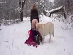 Yasmin Flashy blonde getting fucked by a dog in the snow
