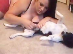 Sexy girl getting fucked by a dog in doggy position on the floor