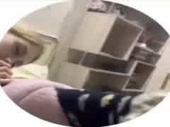 Russian girl kissing dog